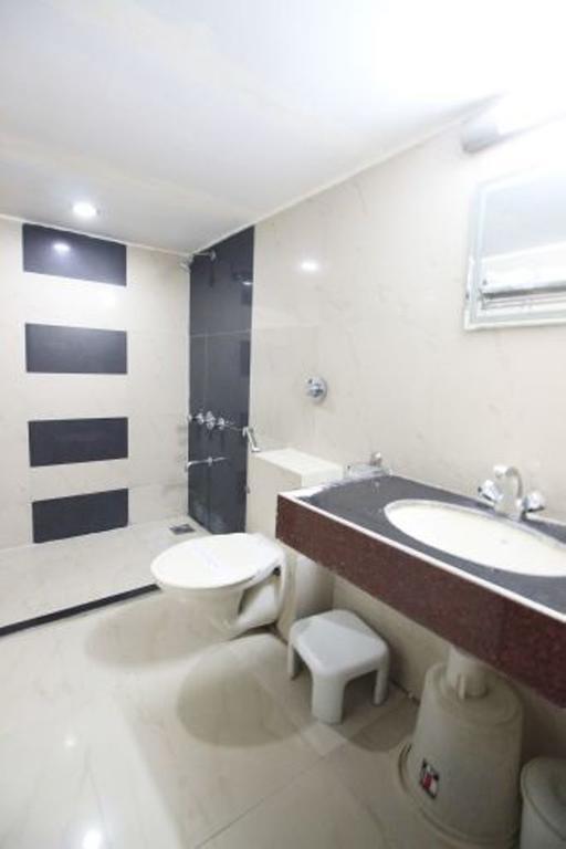 Hotel Eden Ахмедабад Номер фото